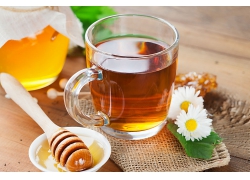清新自然茶水花茶绿茶蜂蜜茶红茶一杯茶透明茶杯高清图片